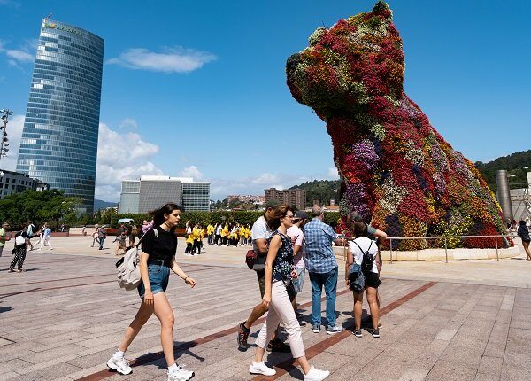 BILBAO, BASQUE COUNTRY, VIZCAYA, SPAIN - 2019/07/30: Jeff Koons Puppy dog sculpture in Guggenheim museum