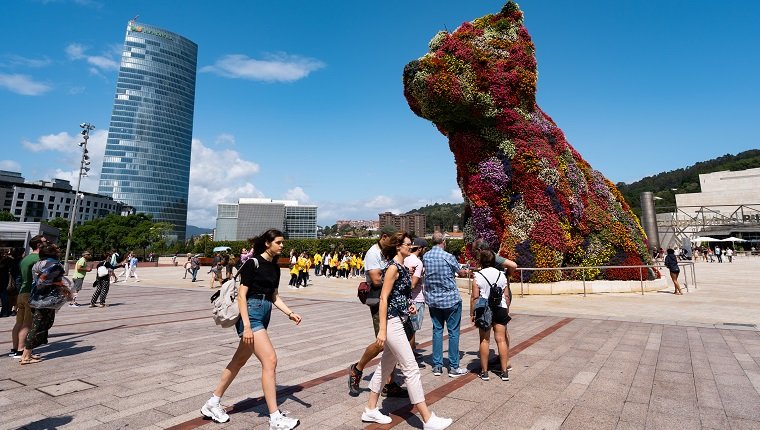 BILBAO, BASQUE COUNTRY, VIZCAYA, SPAIN - 2019/07/30: Jeff Koons Puppy dog sculpture in Guggenheim museum