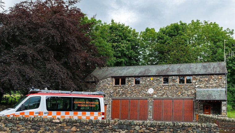 Keswick, England, UK - August 7, 2012: A building and vehicle used by members of Keswick Mountain Rescue Team. Keswick in the English Lake District is a popular tourist destination for hill walkers from the UK and overseas.